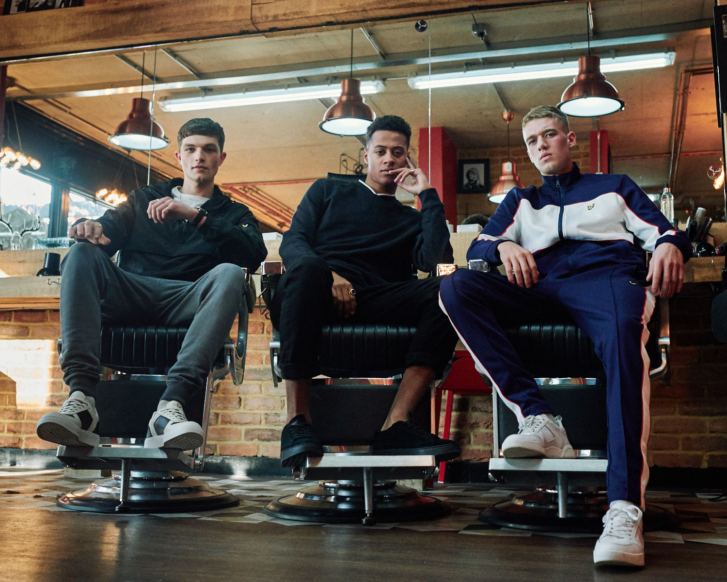 3 Lads in barbershop by lifestyle photographer Tim Cole