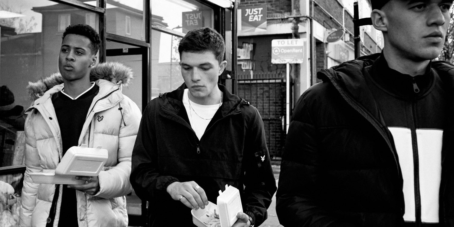 B/W, 3 Lads in winter on street by lifestyle photographer 