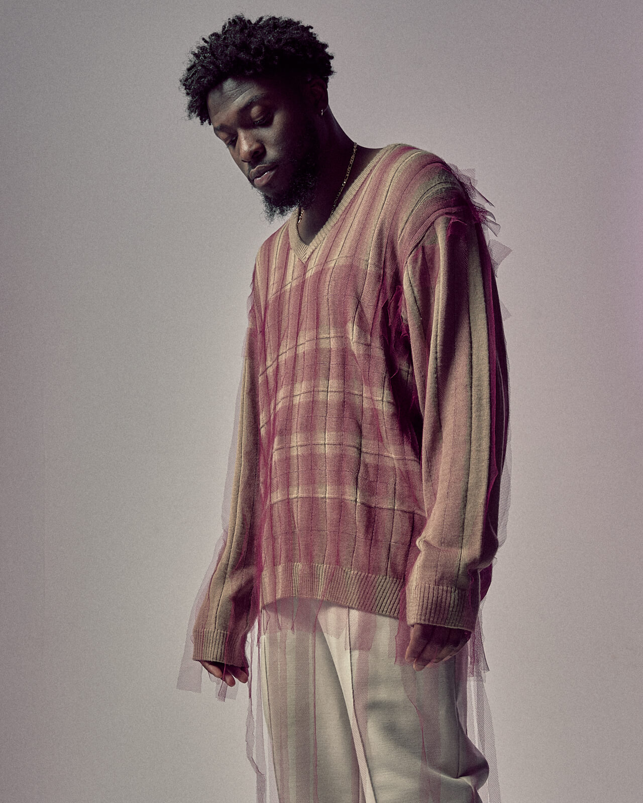 J A looks down by lifestyle photographer Tim Cole