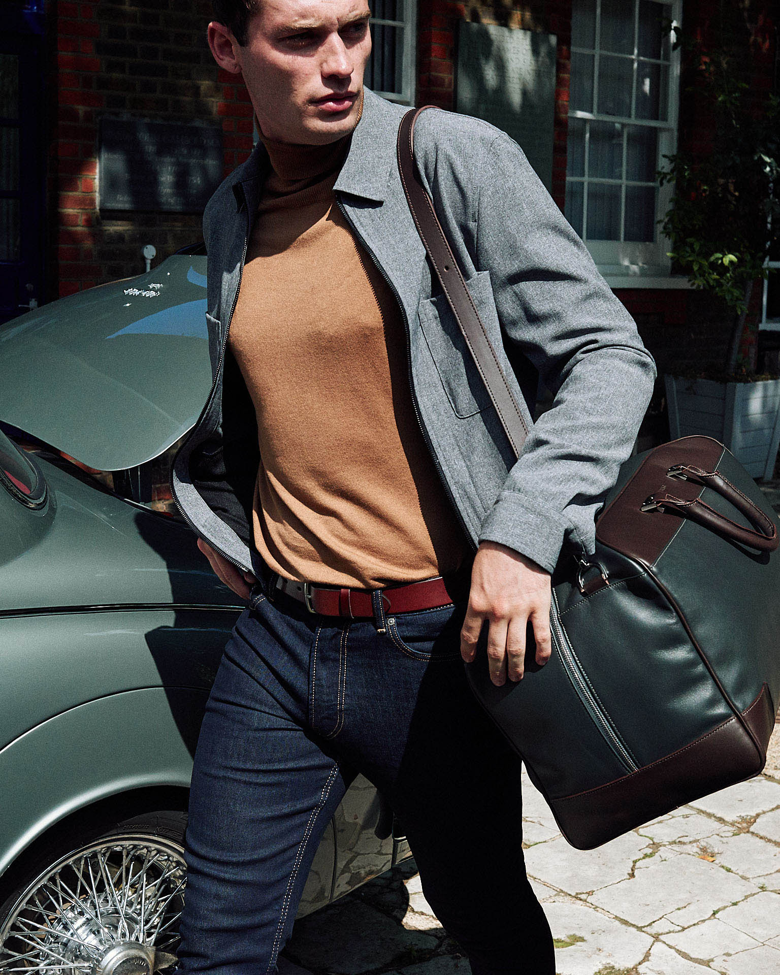 Tusting  stride with holdall by lifestyle photographer Tim Cole 