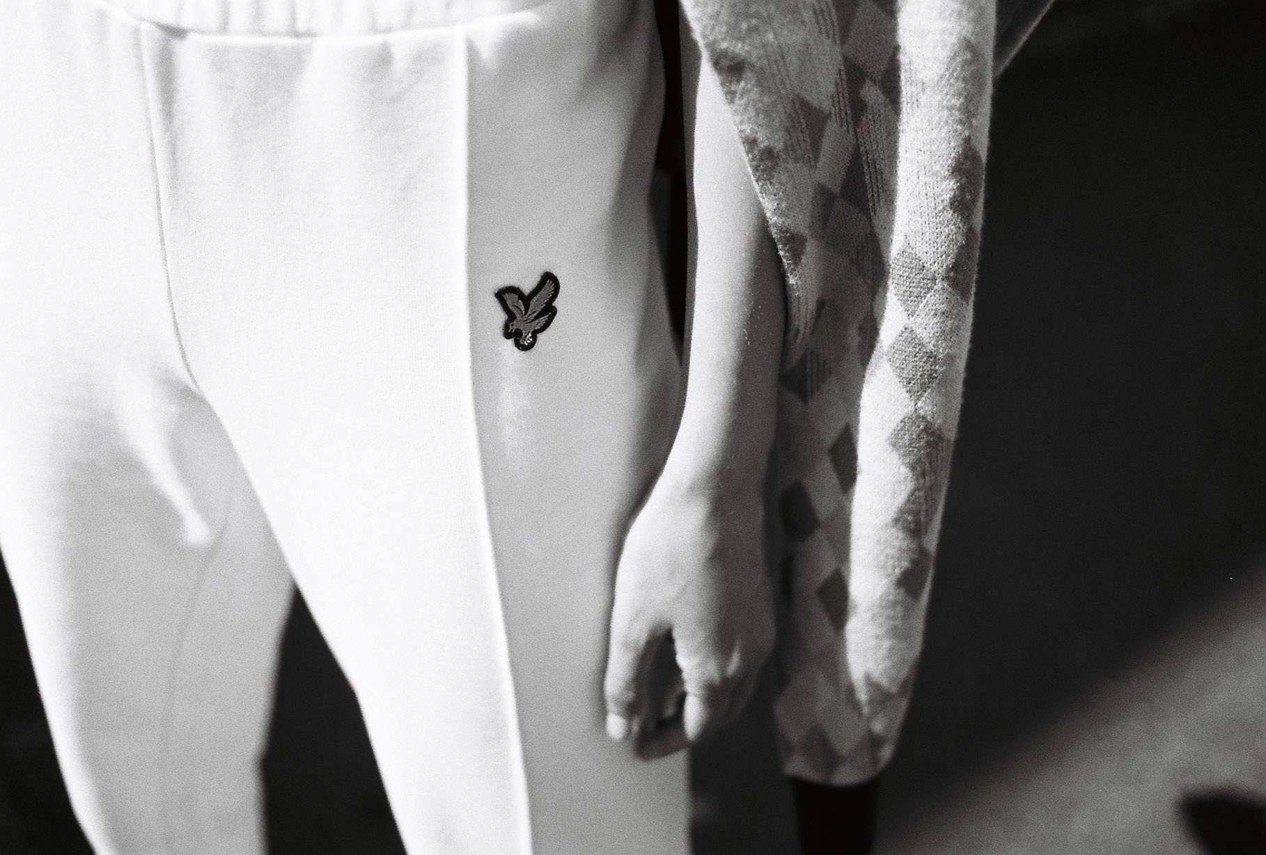 B/W,  white trouser detail by lifestyle photographer  Tim Cole 