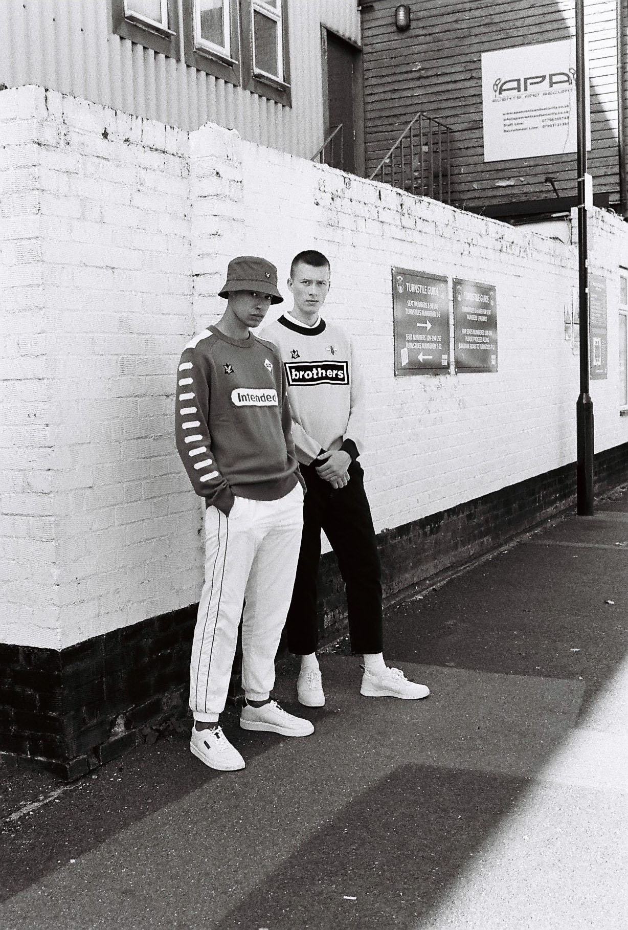 B/W, outside football ground by fashion photographer 