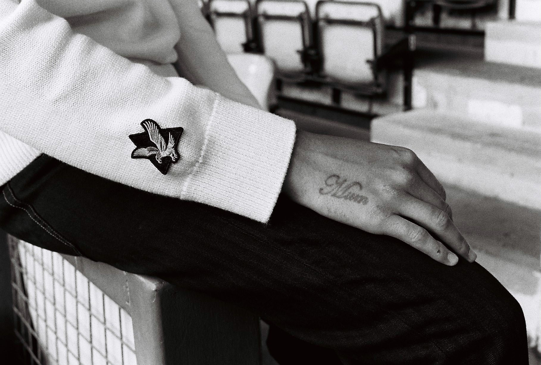 B/W, arm detail, Lad in Neal Heard Lyle and Scott 