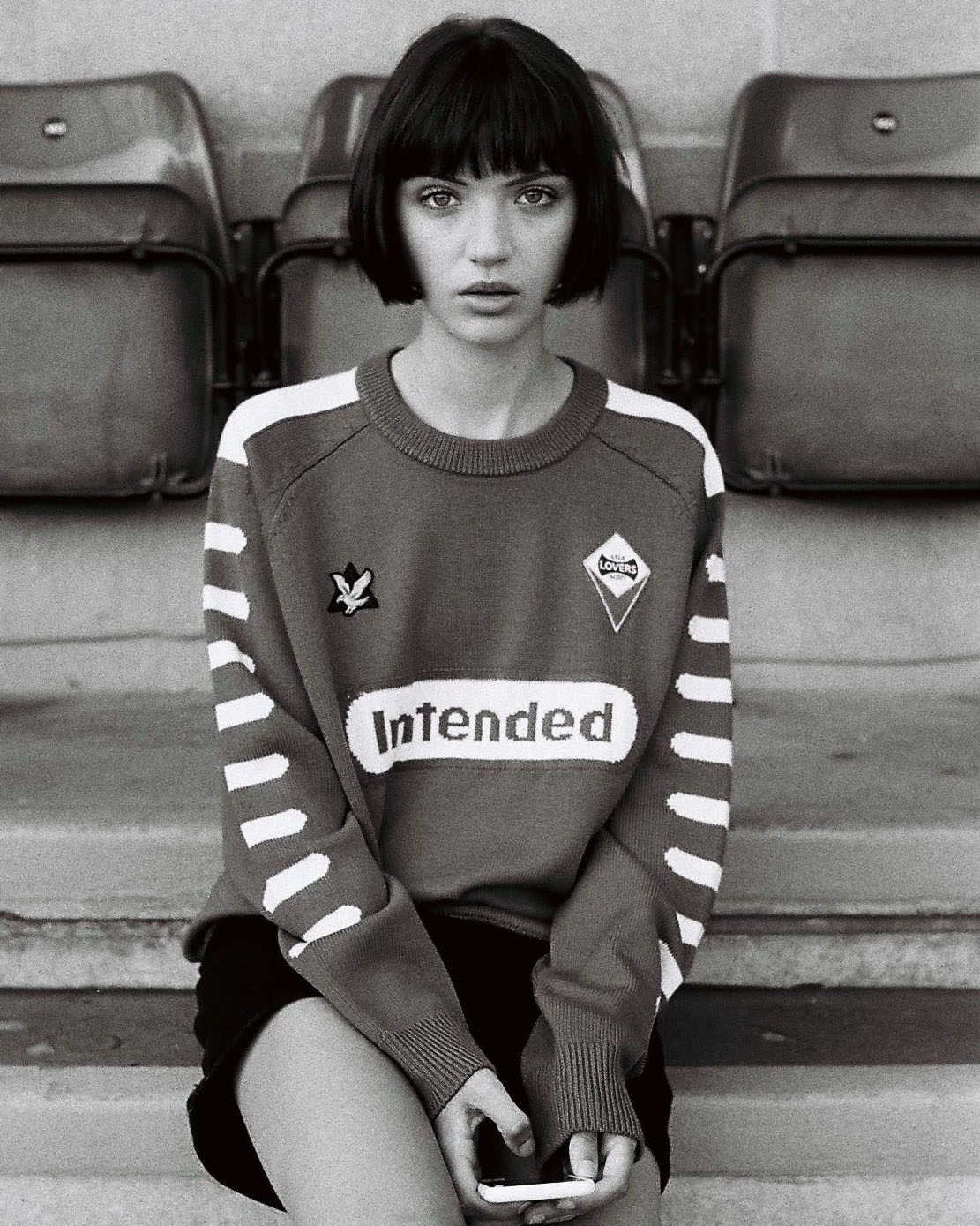 girl  on stadium seat by lifestyle photographer Tim Cole 