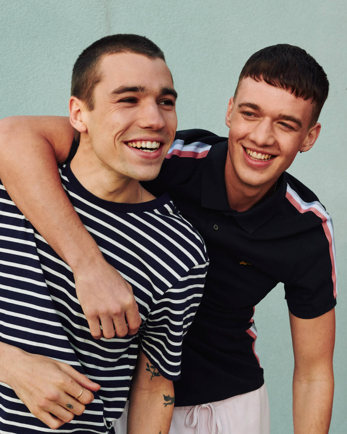 Lyle and Scott embrace by  lifestyle photographer Tim Cole 