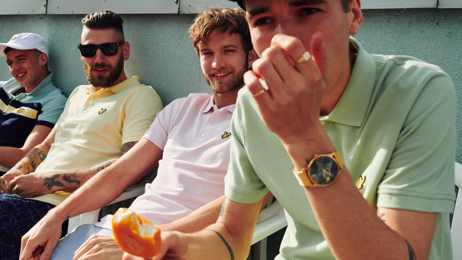 lifestyle photography  lads, sun themselves on terrace 