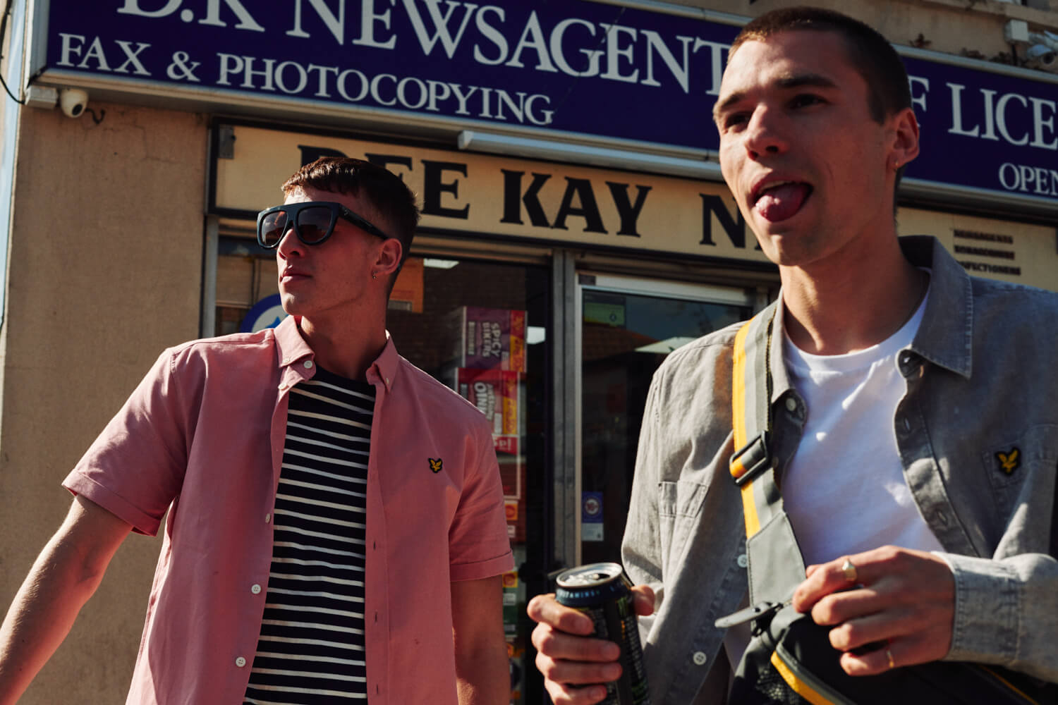 Two lads,  newsagent shop, by lifestyle photographer Tim Cole