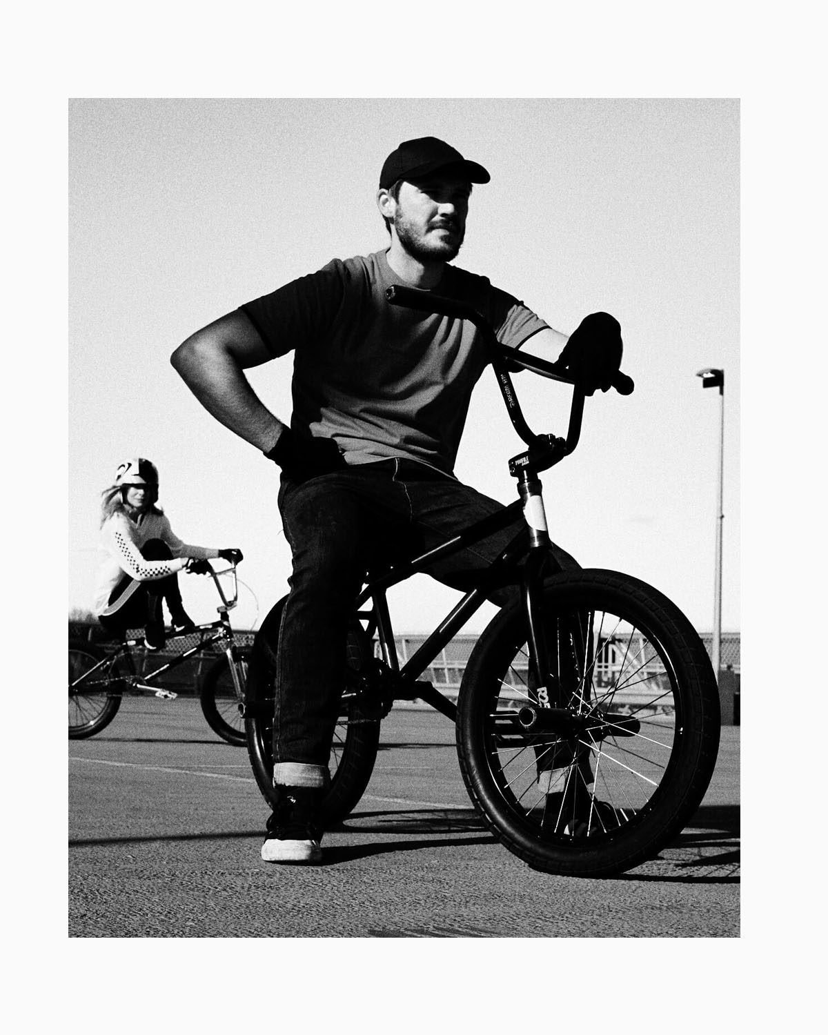 portrait sat on a street bike by  lifestyle photographer Tim Cole 