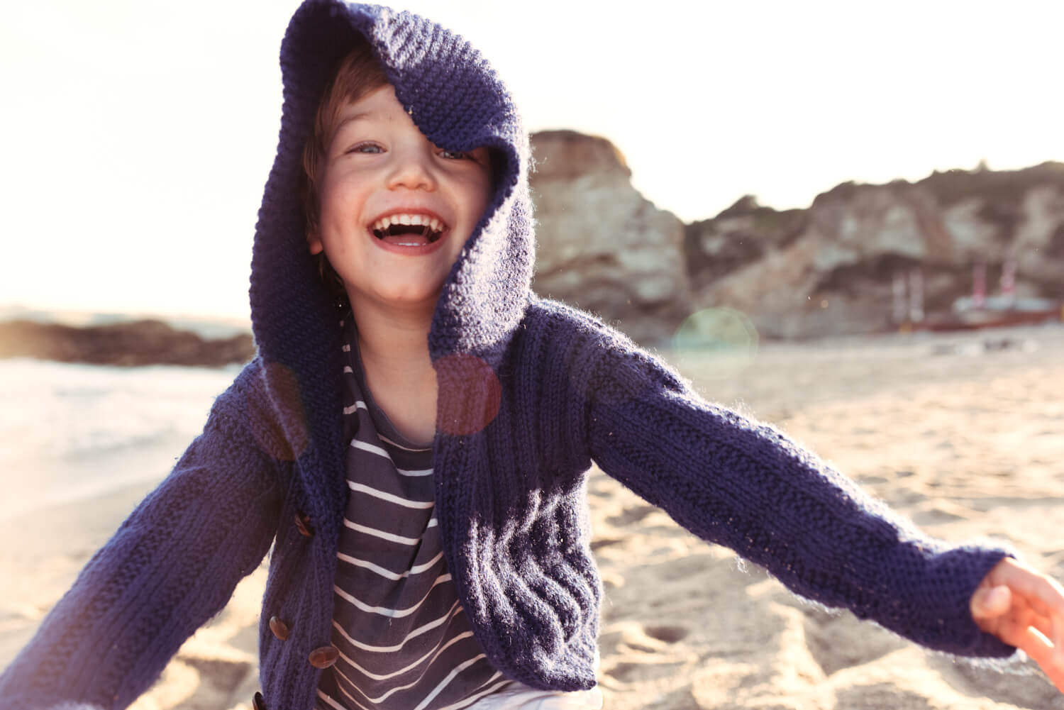  Lifestyle photographer Tim Cole shoots boy in blue hooded jumper 