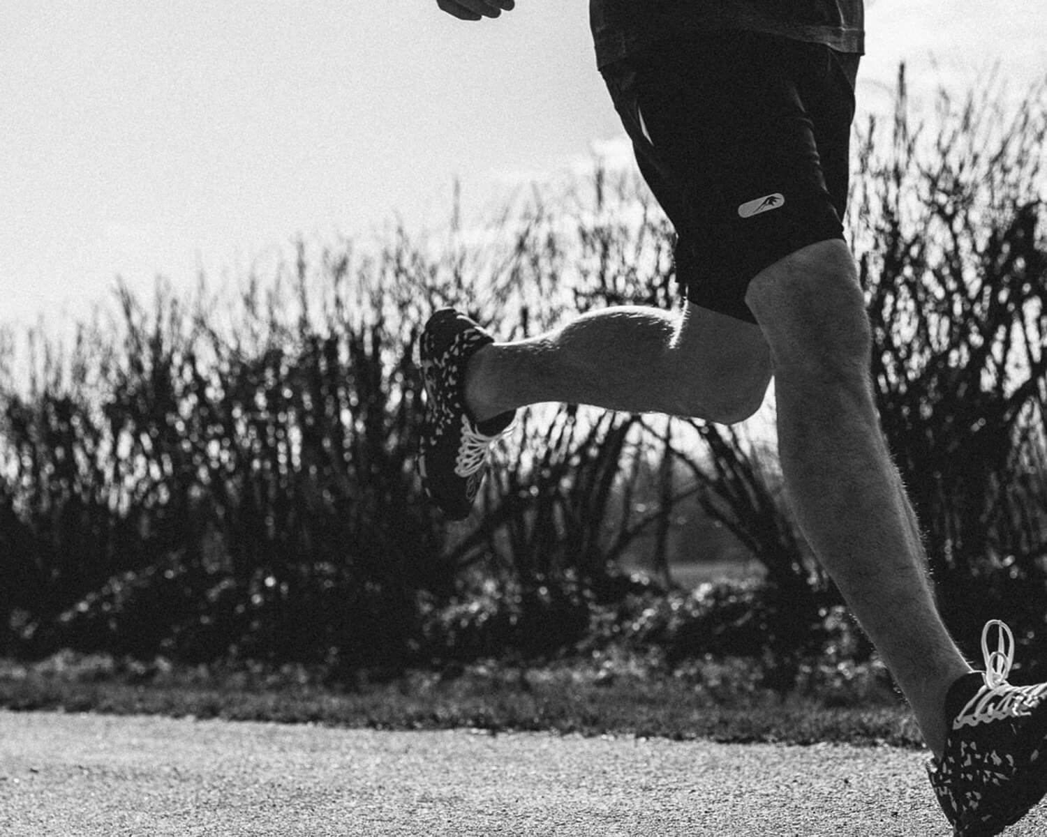 Legs run past camera by lifestyle photographer Tim Cole