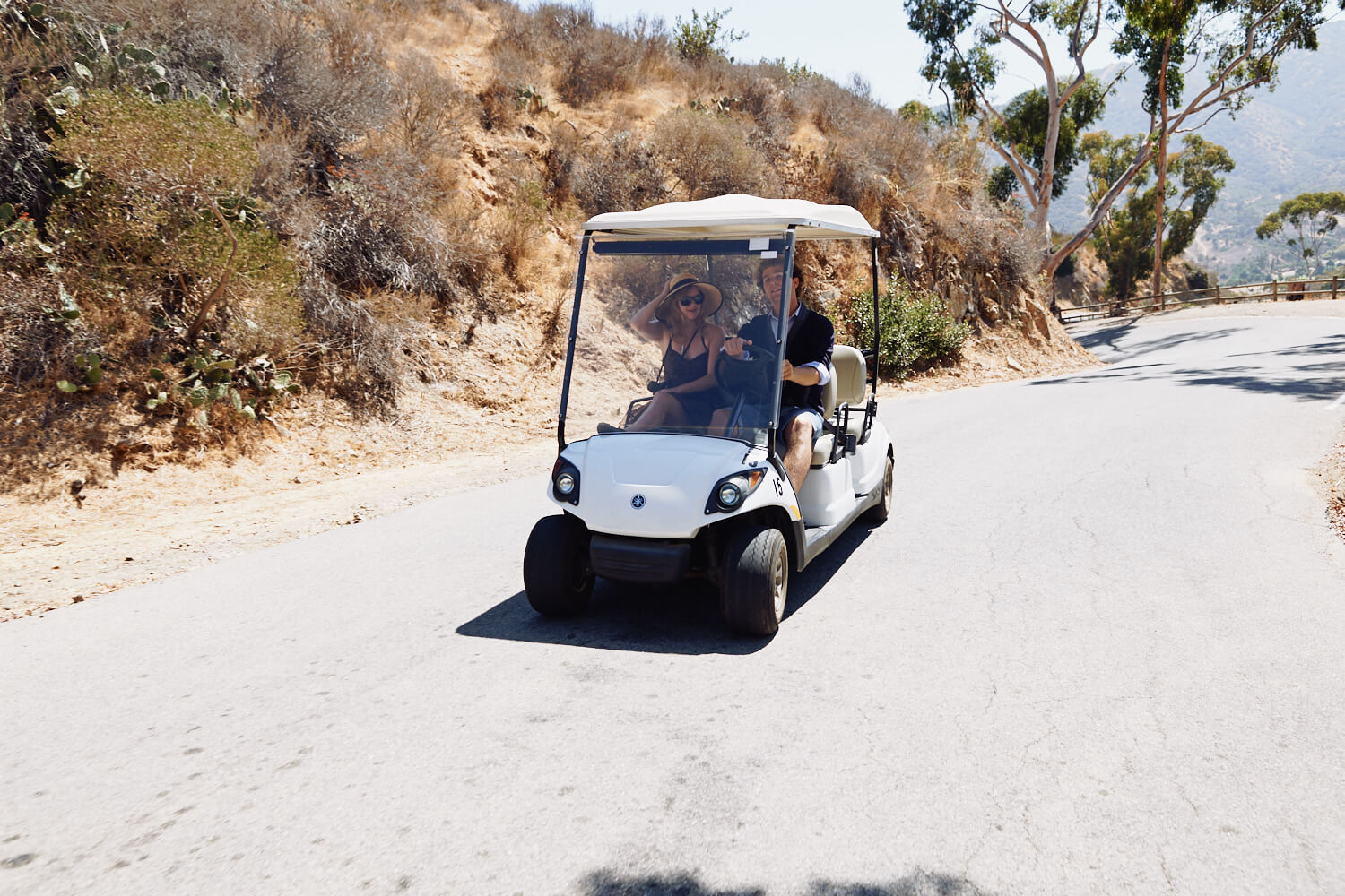 couple, ride in golf cart  by lifestyle photographer