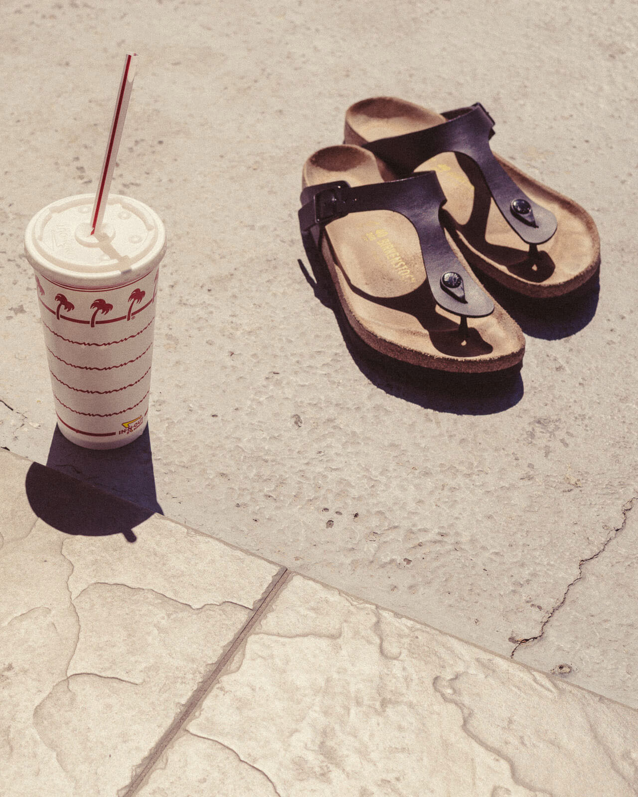 Sandals and in-and-out  by lifestyle photographer Tim Cole