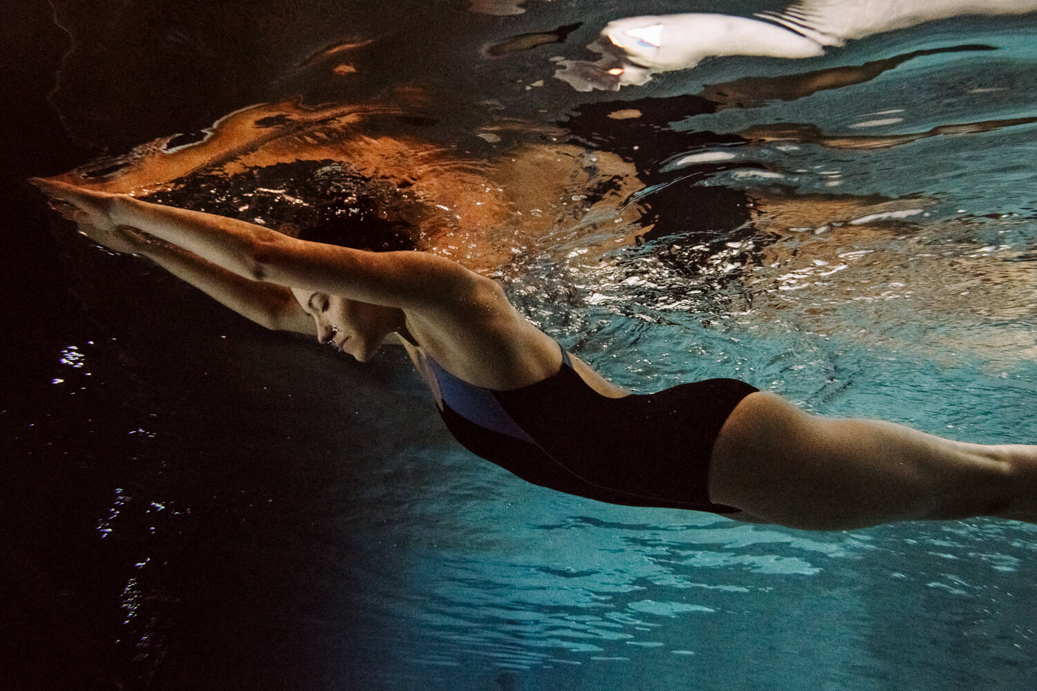 Stretches underwater by lifestyle photographer Tim Cole
