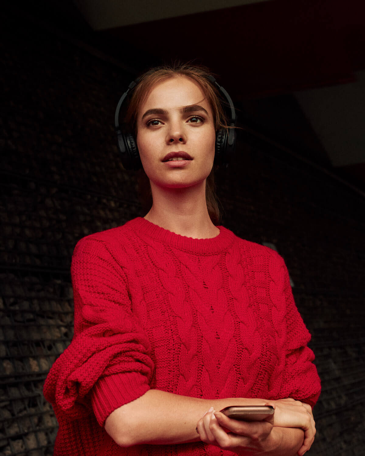 Girl, jumper, with headphones, portrait photographer Tim Cole
